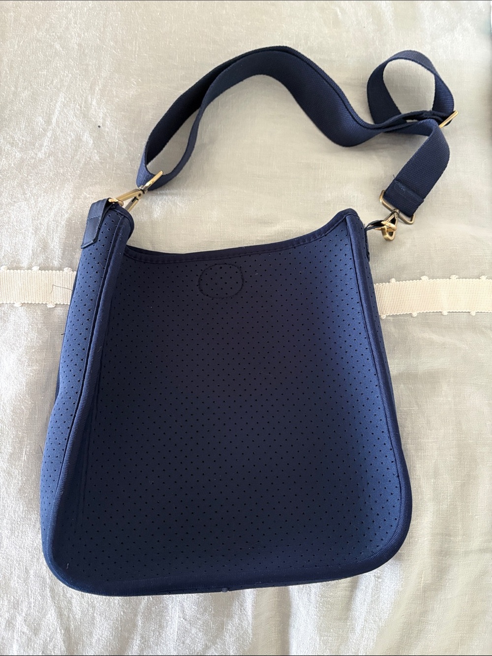 Ah-dorned Navy Perforated Neoprene Crossbody Bag